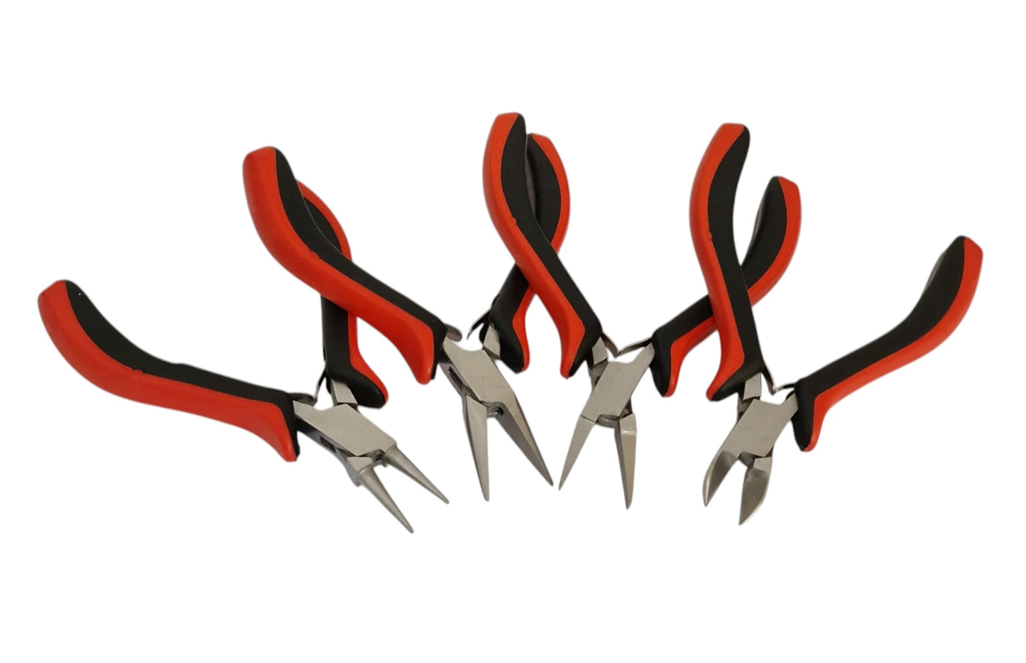 Set of four pairs of red and black pliers on a white background
