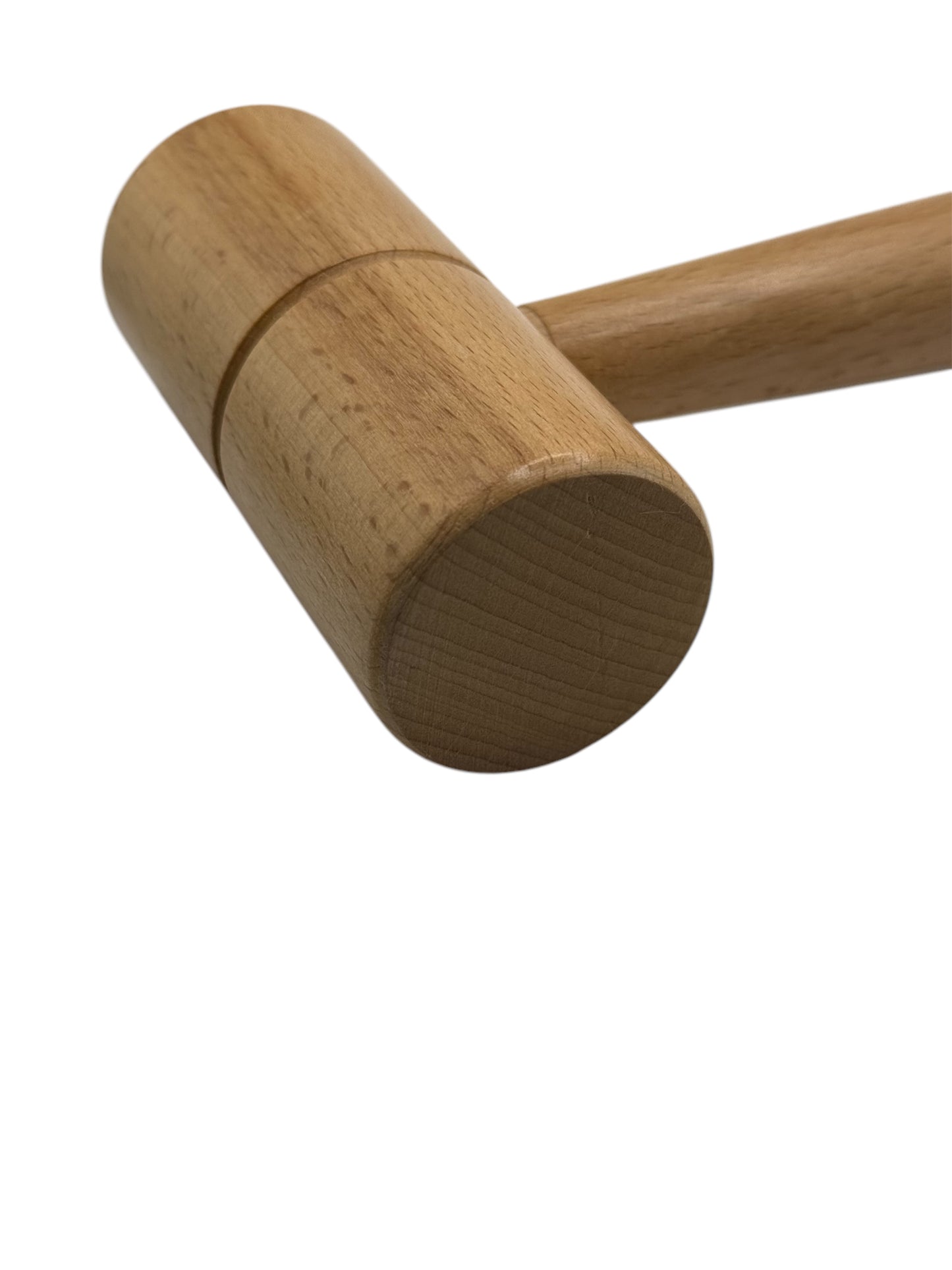 A close-up of a wooden mallet with a circular head and a long handle.
