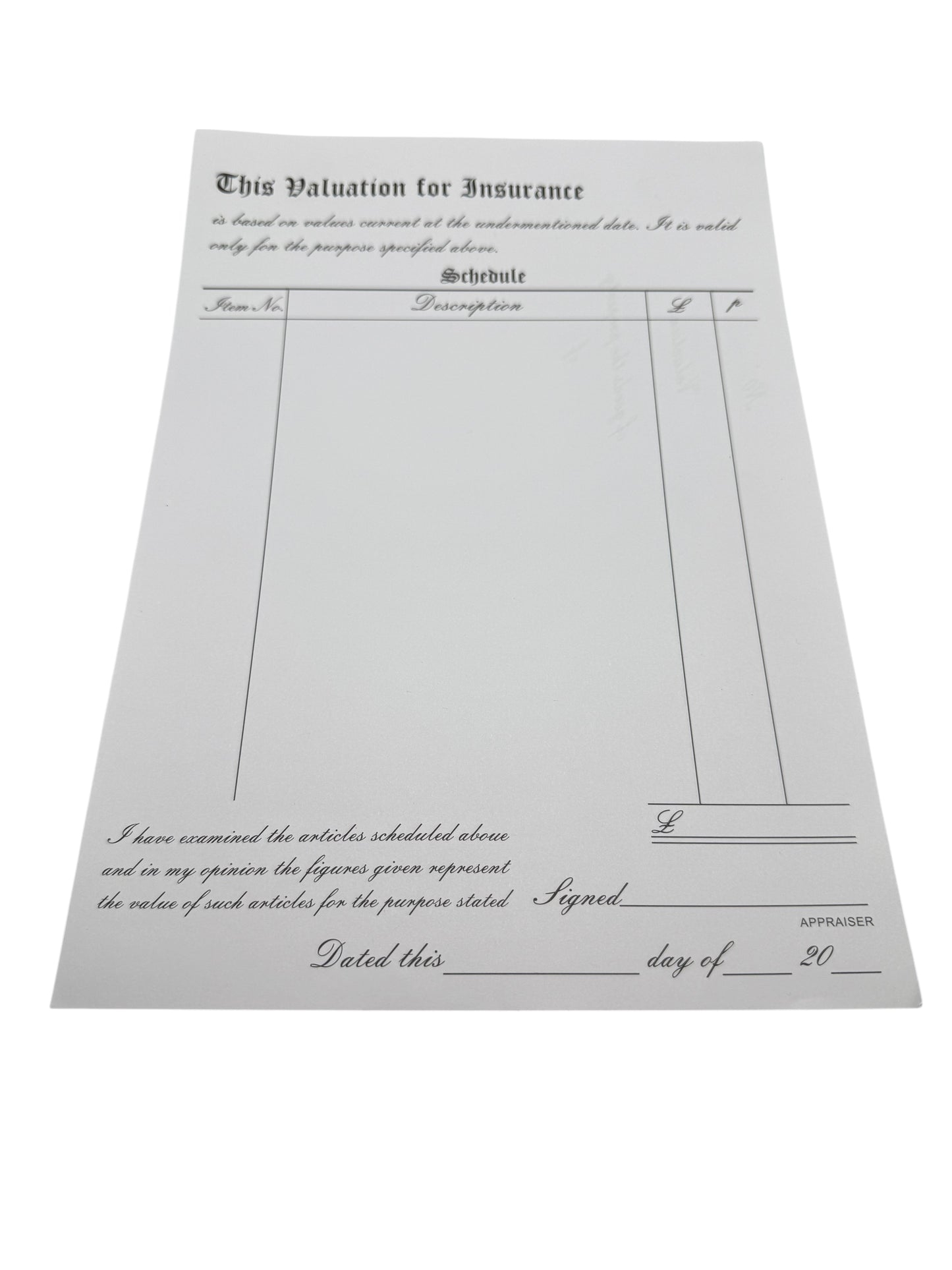 Vintage insurance valuation document on a white background