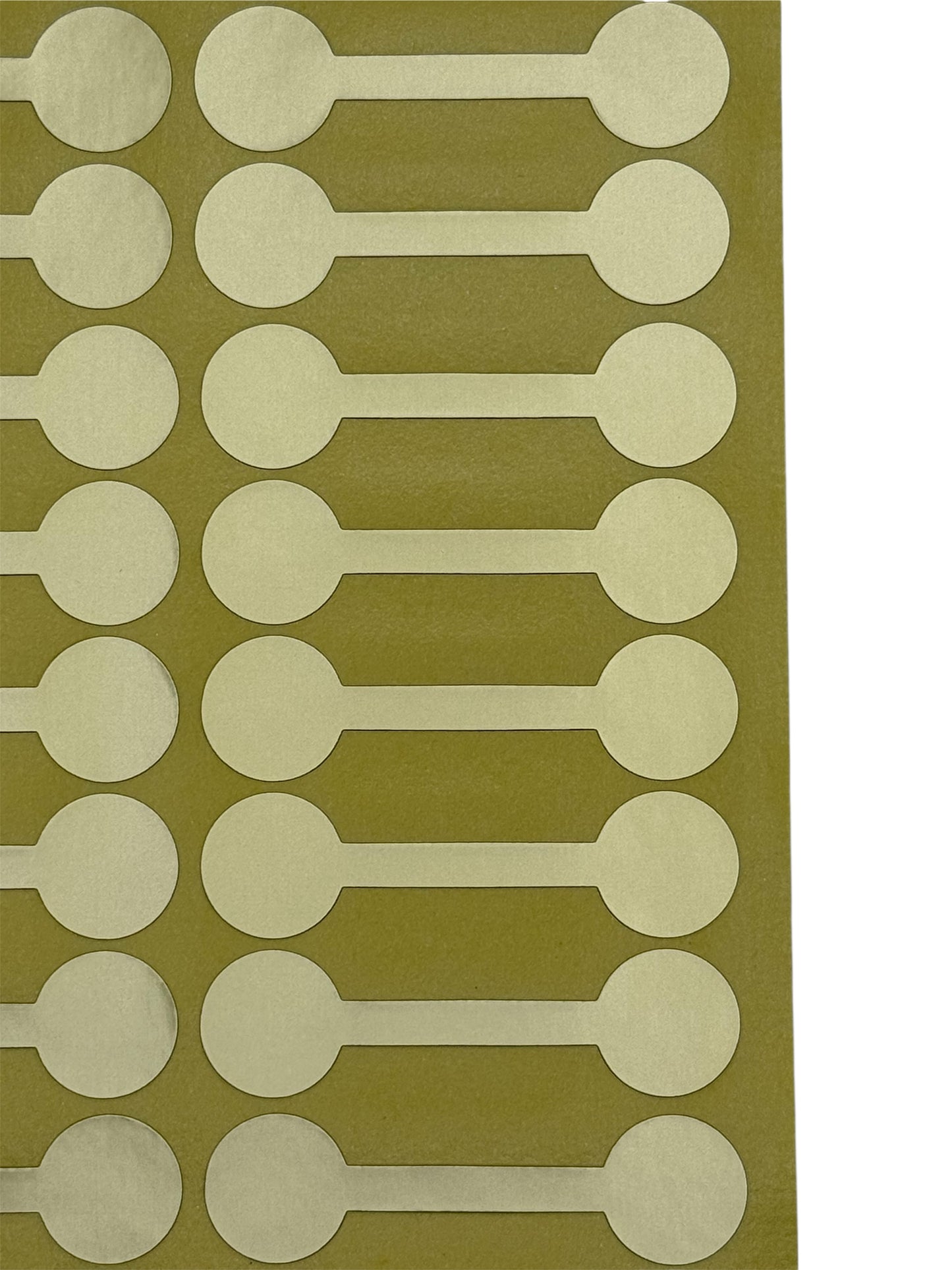 Close up of Gold dumbell stickers