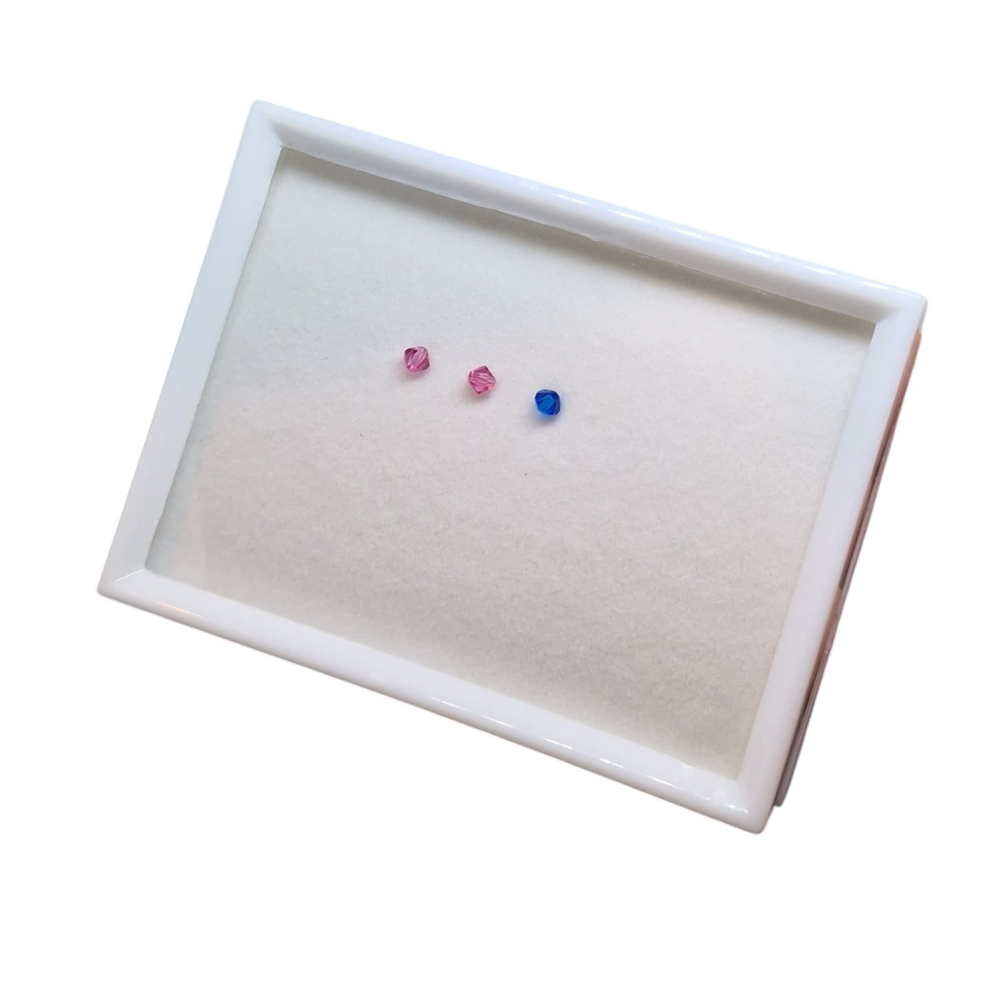 A plastic display box with transparent covers, designed to store and display loose stones. The box is white with a black interior and has a rectangular shape.