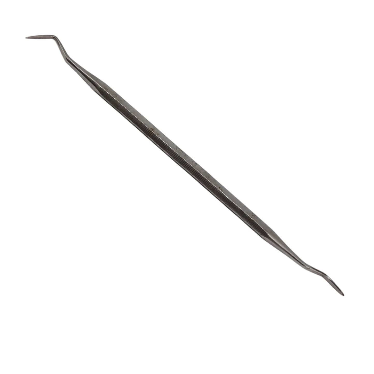 Double ended wax carving tool on white background
