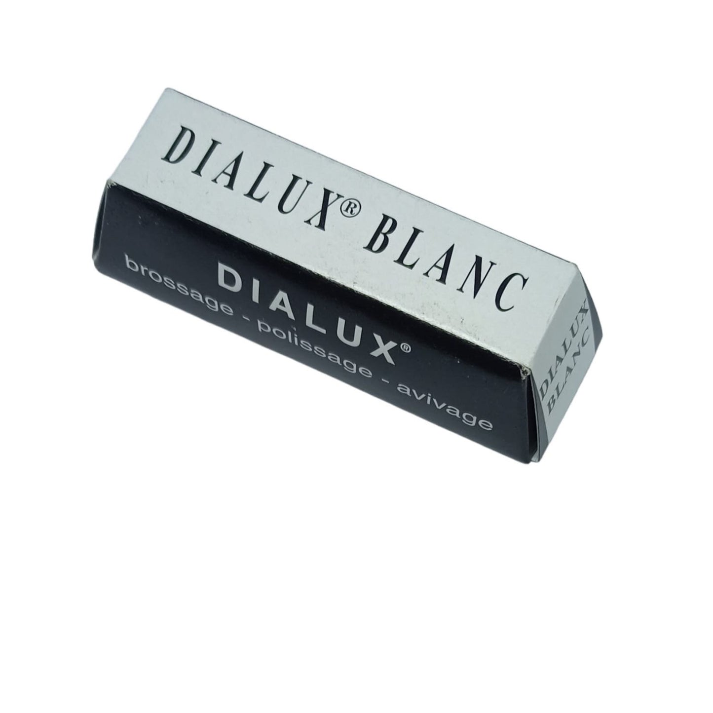 A silver-colored bar of Dialux White polishing compound for jewelry with black text on it, next to its black packaging.