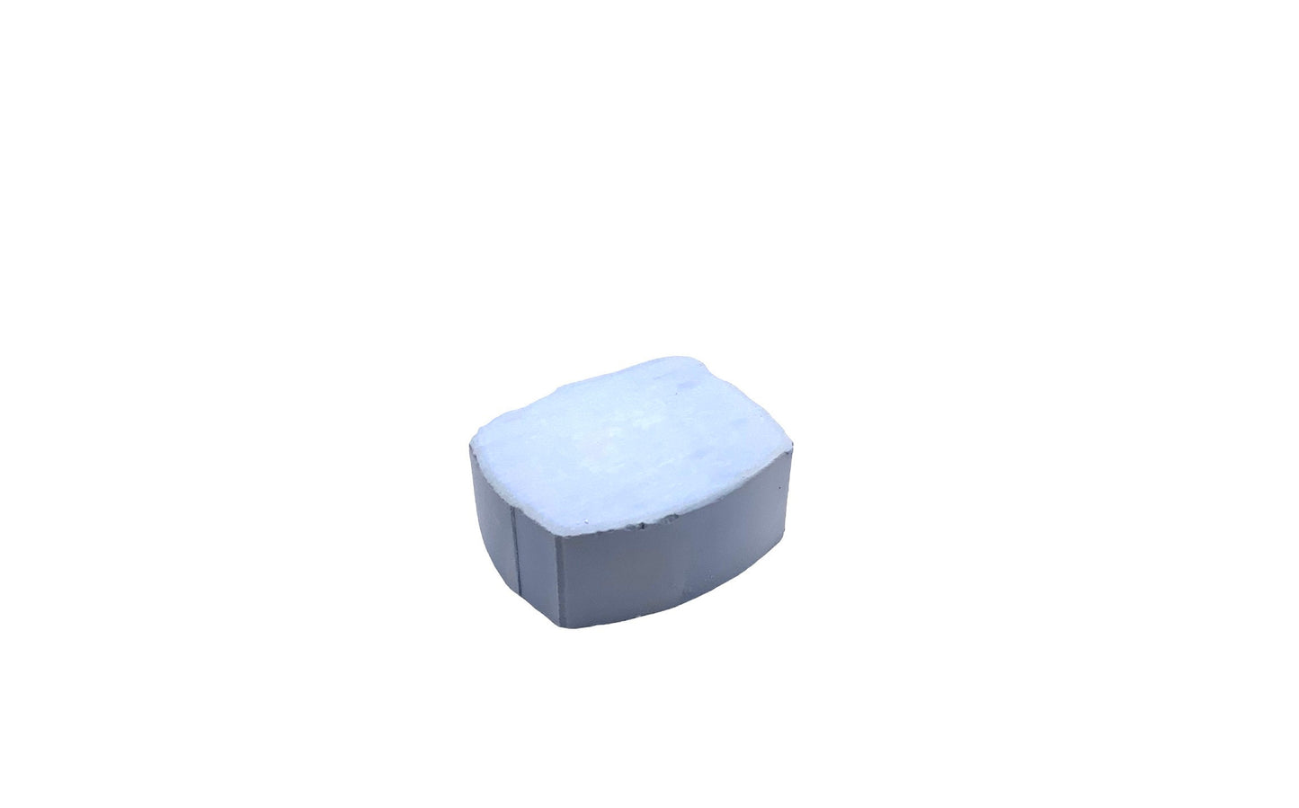 A small bar of blue Menzerna polishing compound against a white background.