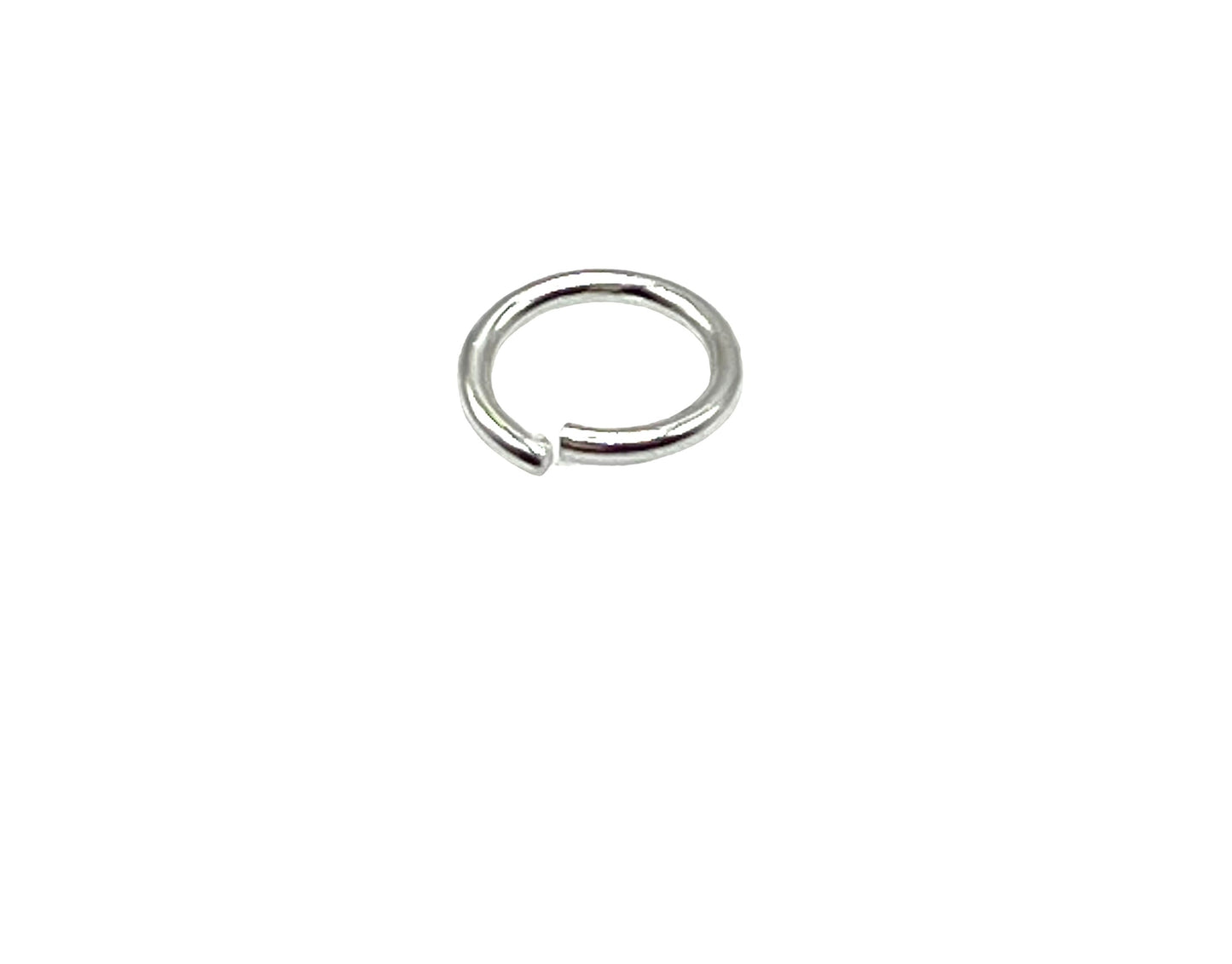 A single sterling silver jump ring with a 2mm diameter.