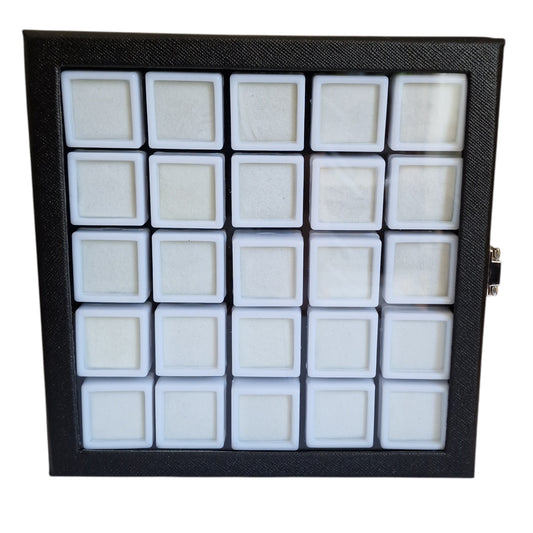 Black display case with white compartments on a white background