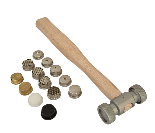 Set of metal tools with a wooden handle hammer on a white background