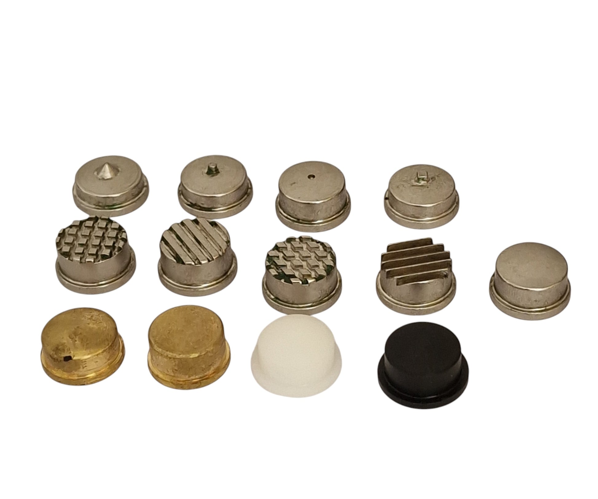 Collection of metal and brass components on a white background