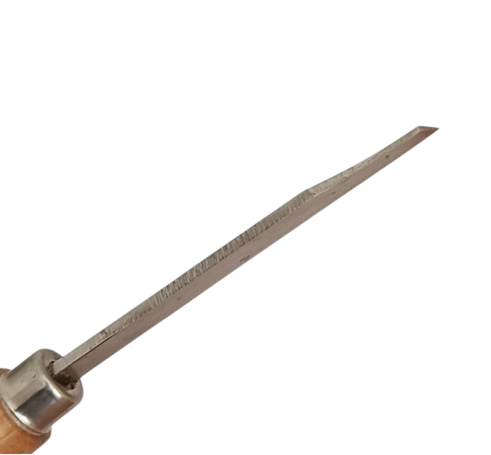Close up of graving tool