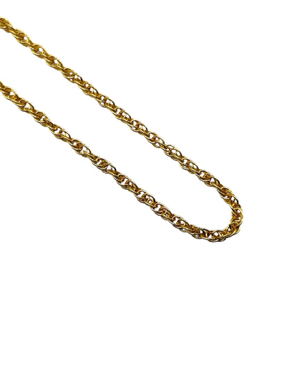 Gold chain on a white background