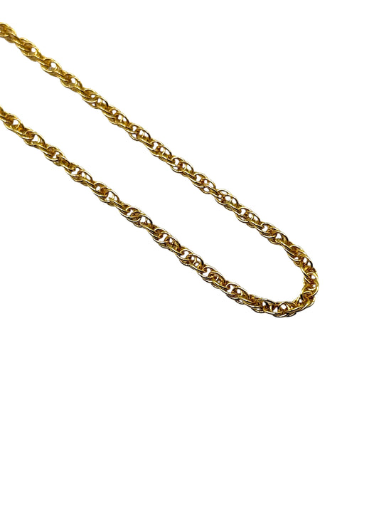 Gold chain on a white background