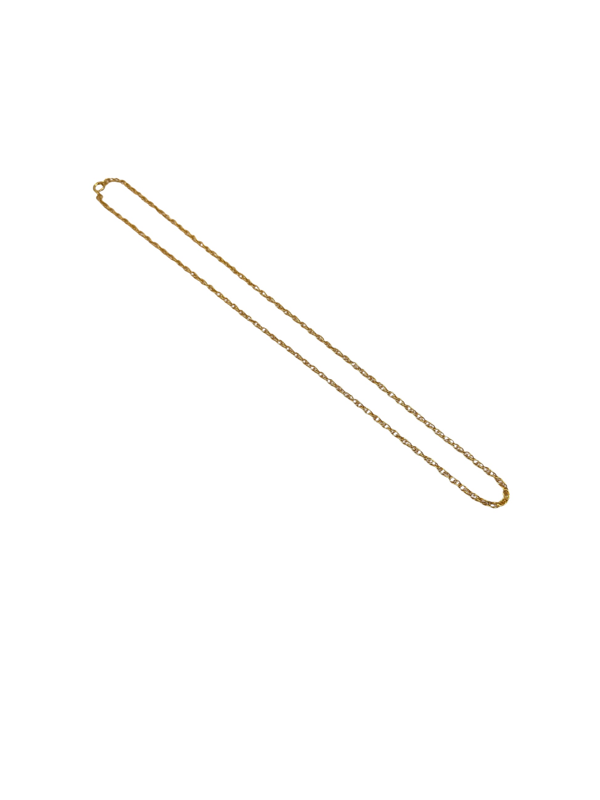 Gold chain necklace on a white background
