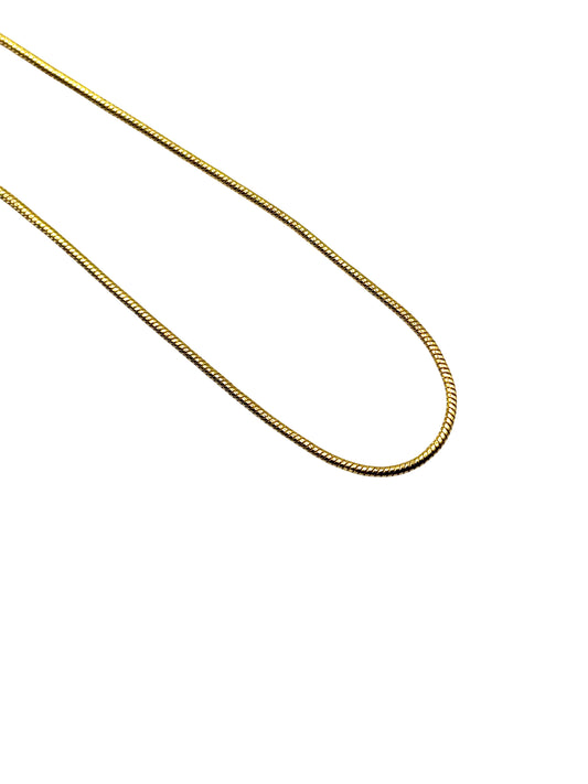 Gold chain on a white background