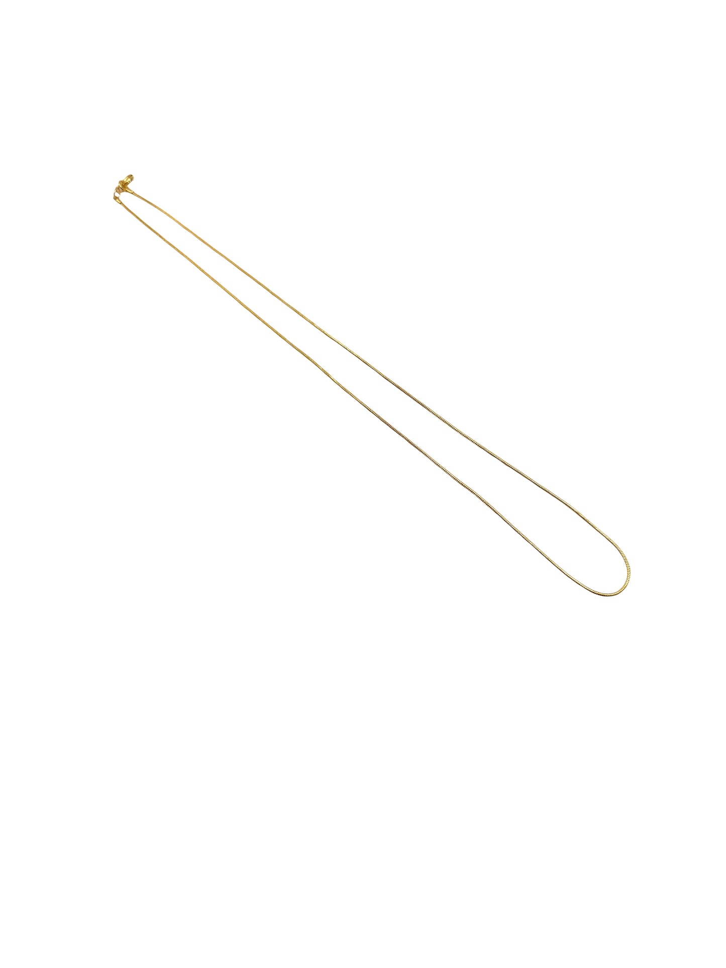 Gold necklace on a white background