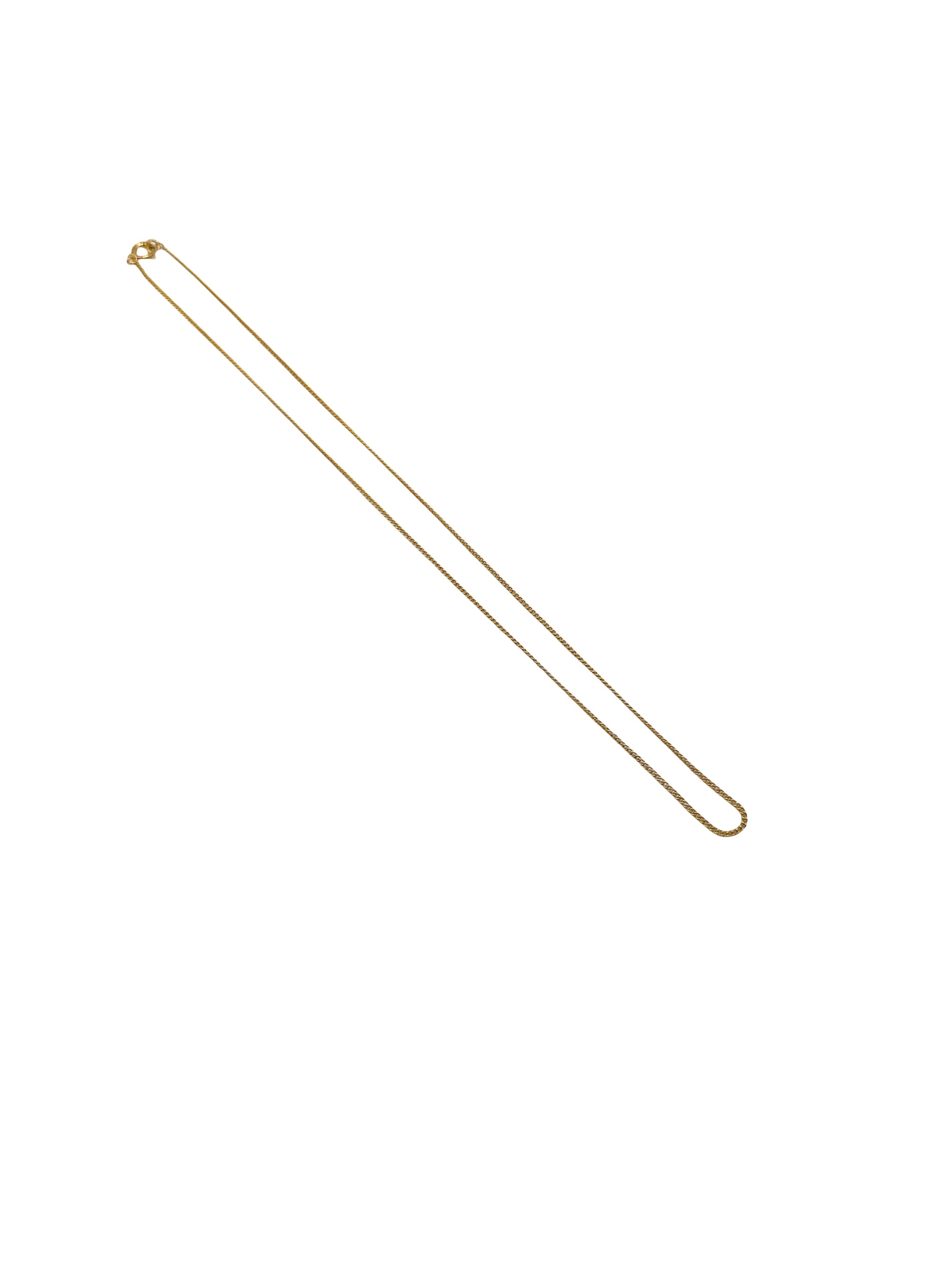 Gold necklace chain on a white background