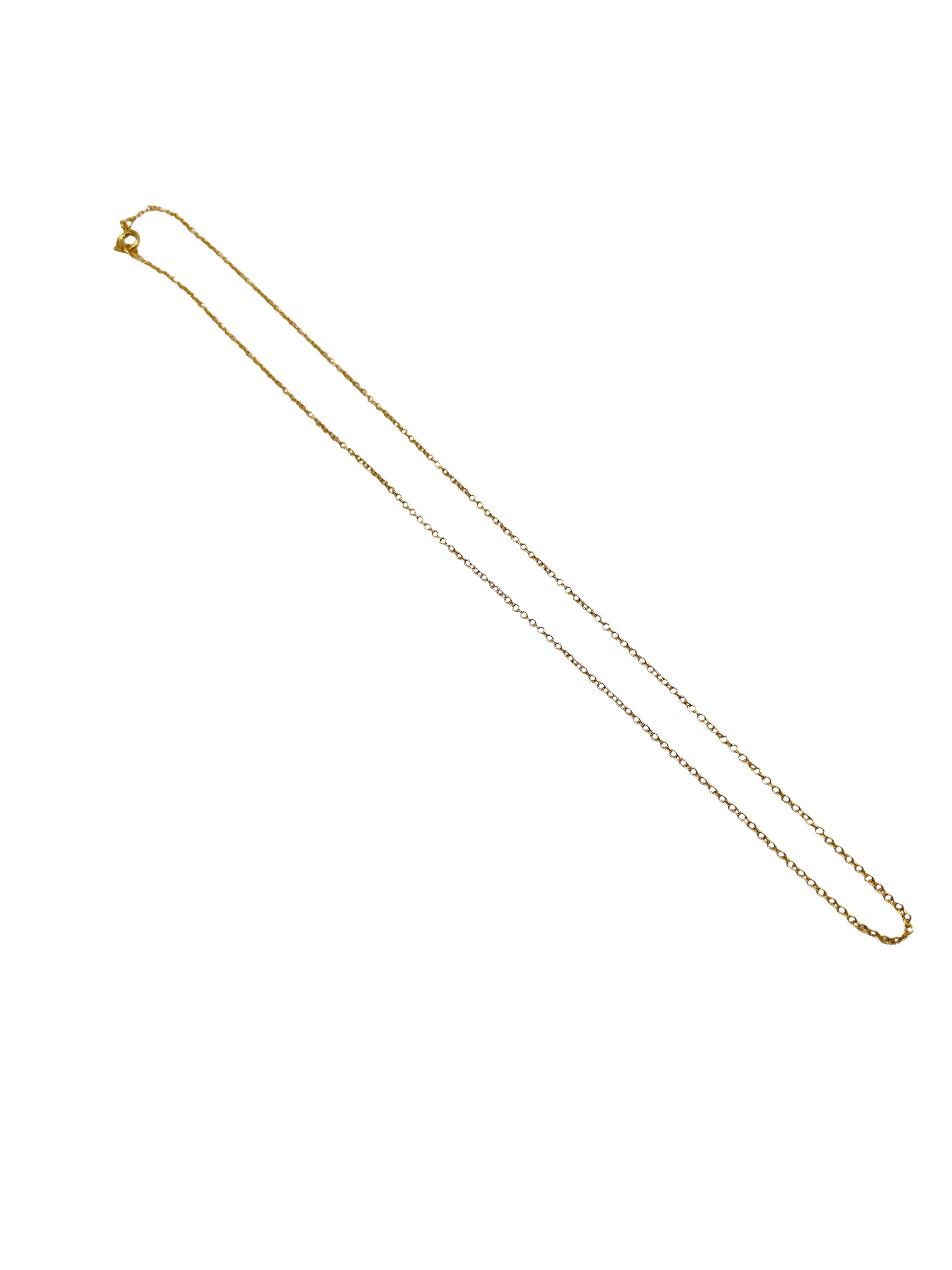 Gold chain necklace on a white background