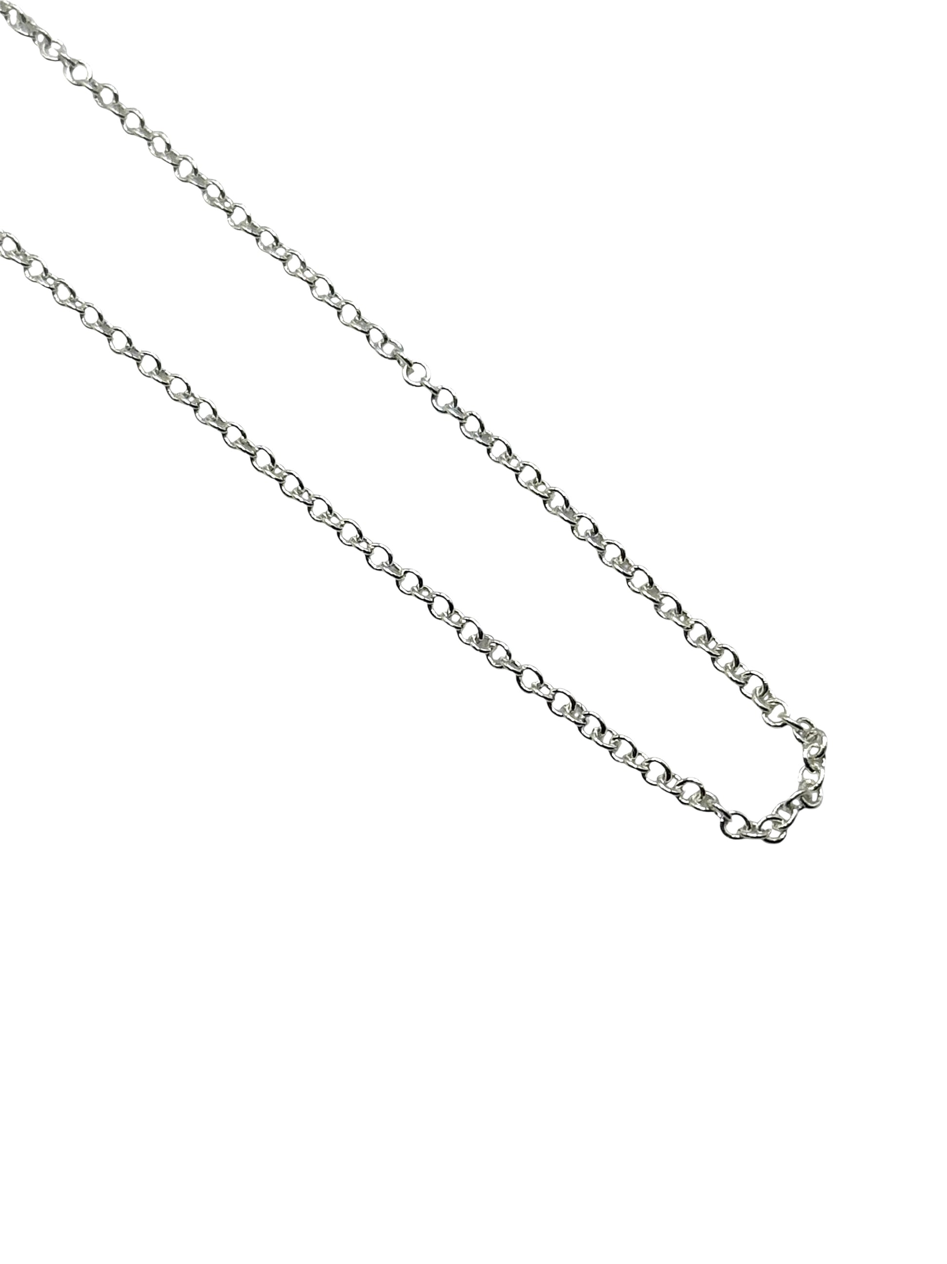 Silver chain necklace on a white background