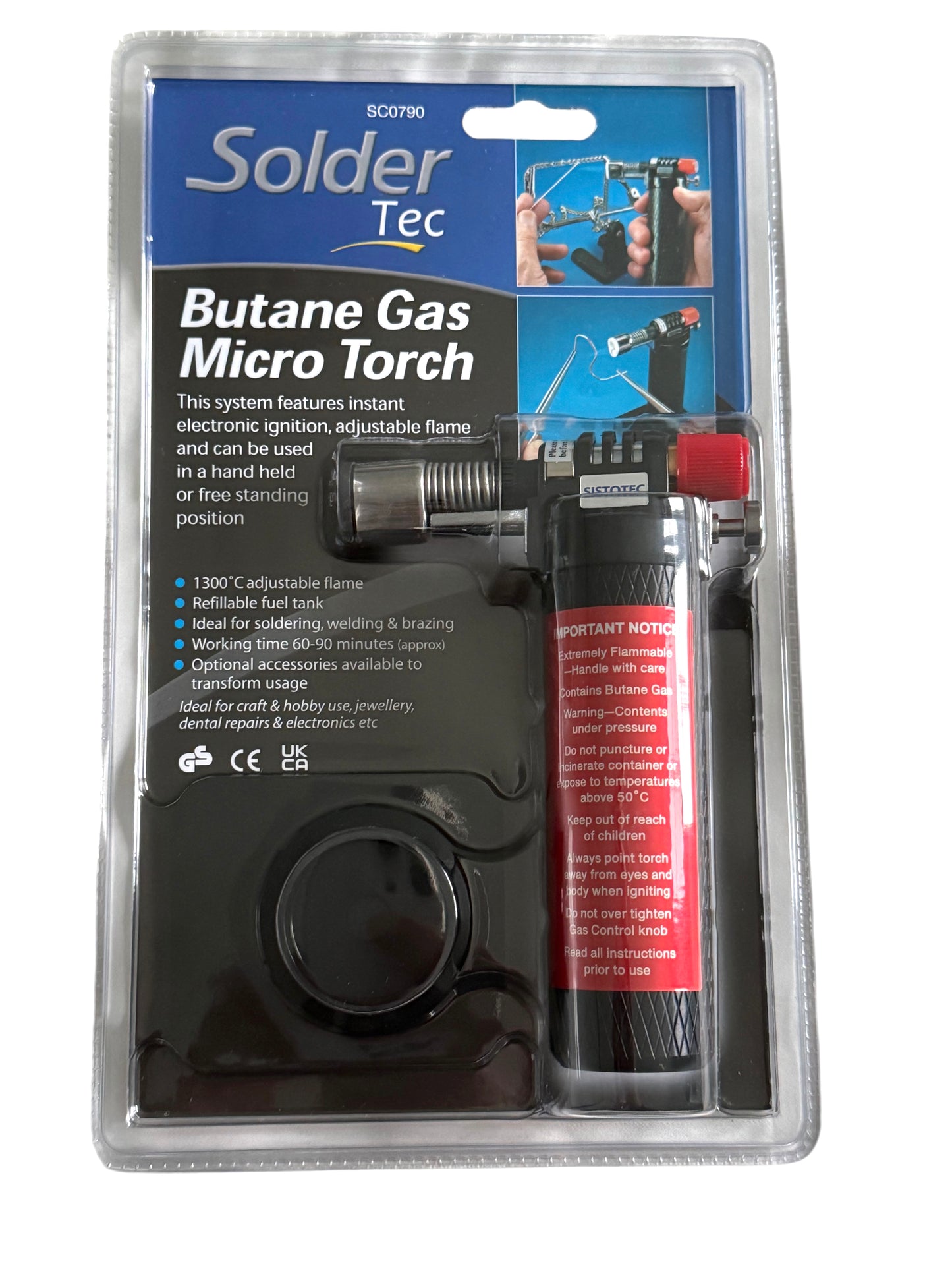 Packaged butane micro torch with a black and red color scheme, branded by Solderer TEC, in a clear plastic blister pack with product information and instructions.