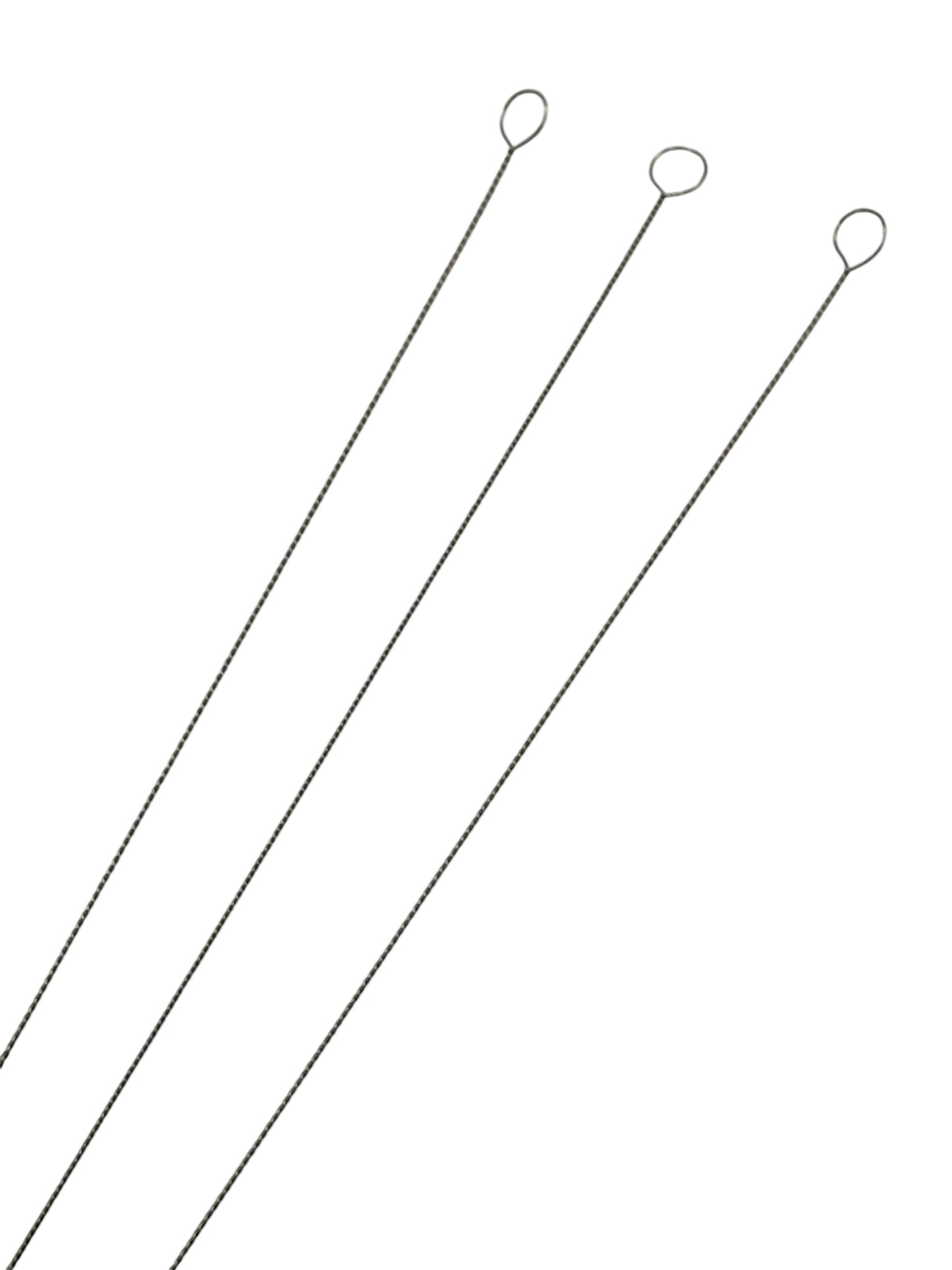 Beading needles on white background close up