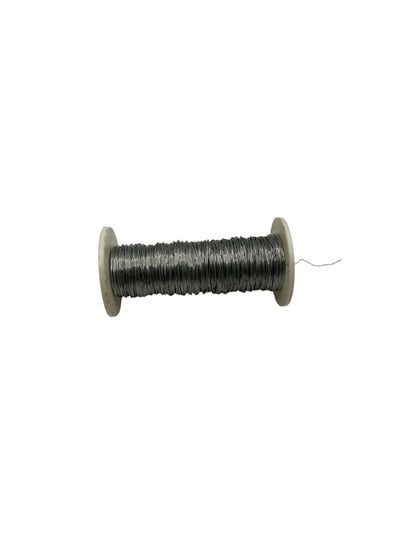 Spool of wire on a white background