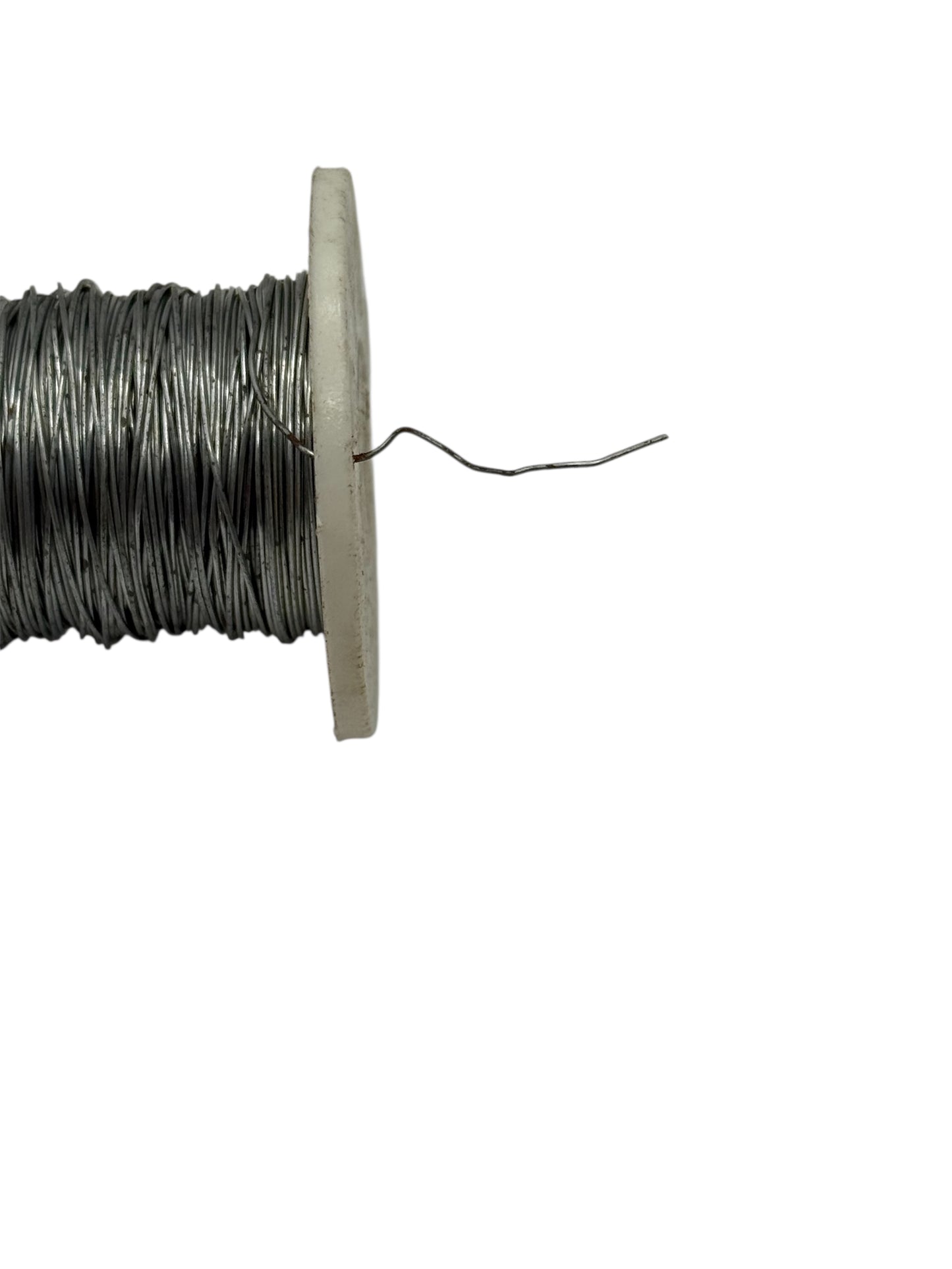 Spool of wire on a white background