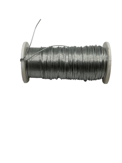 Spool of wire on a white background