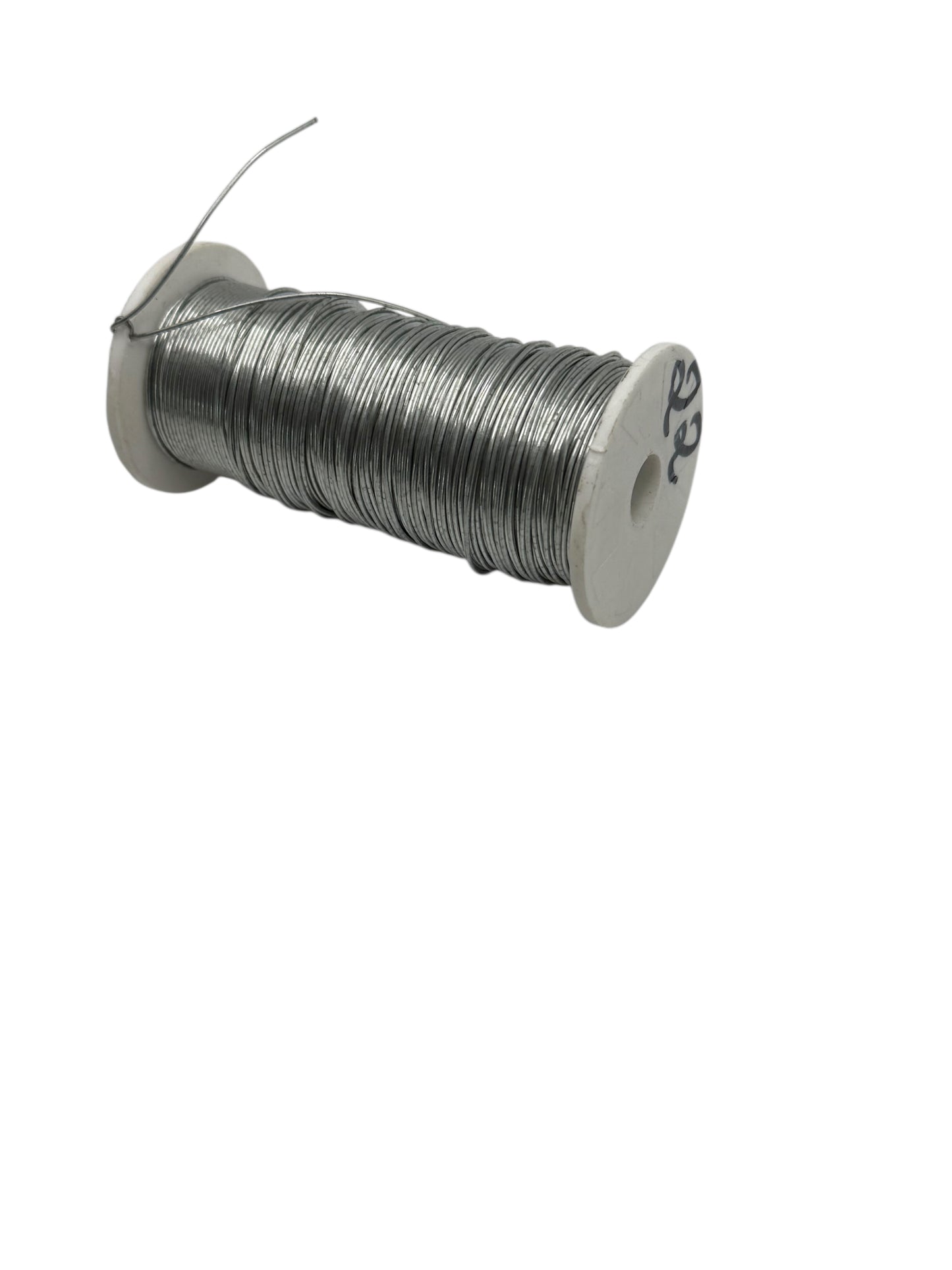 Spool of wire on a white background