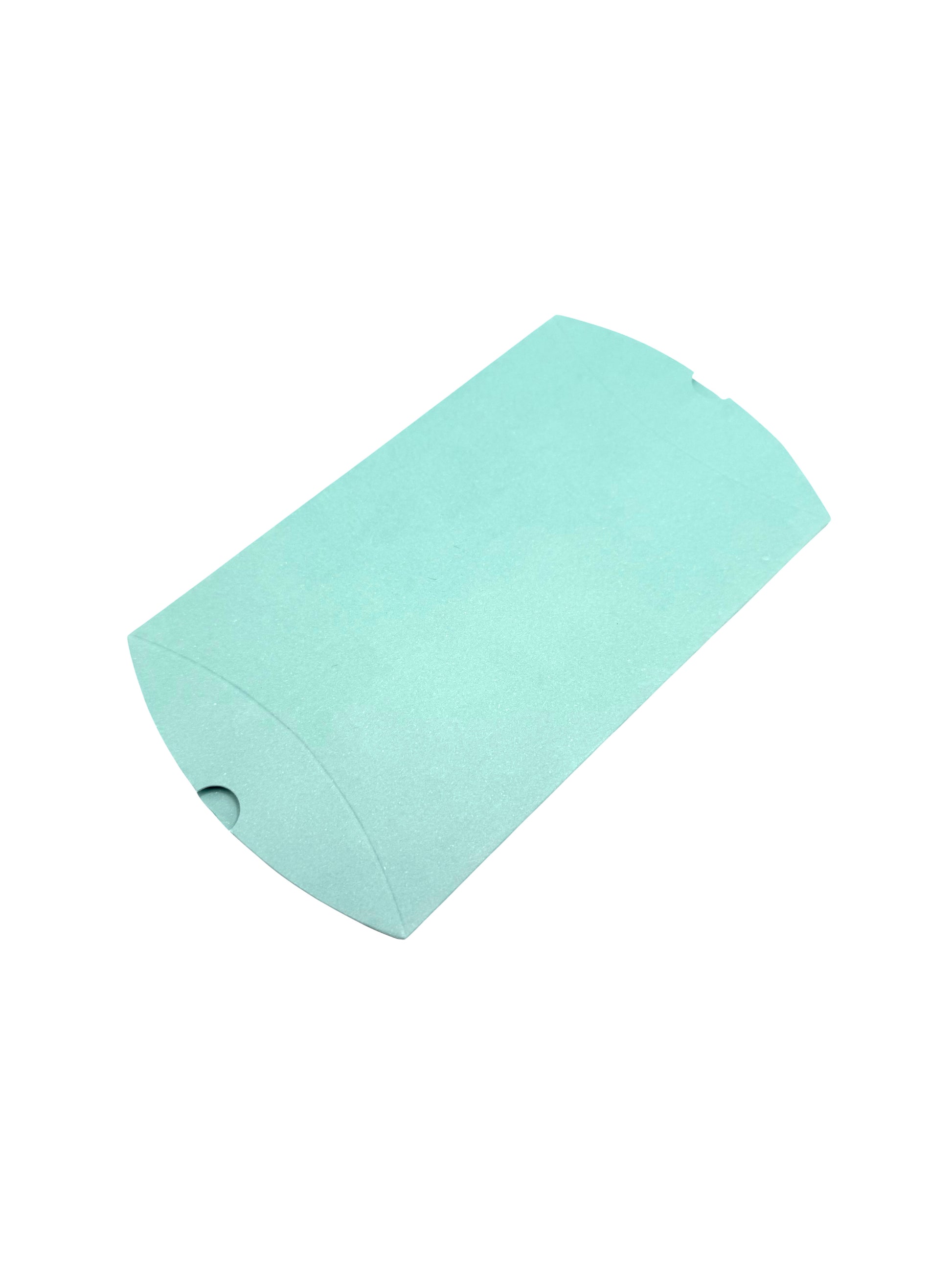 “Medium light green pillow gift box in curved design, flat-packed and eco-friendly – angled view”