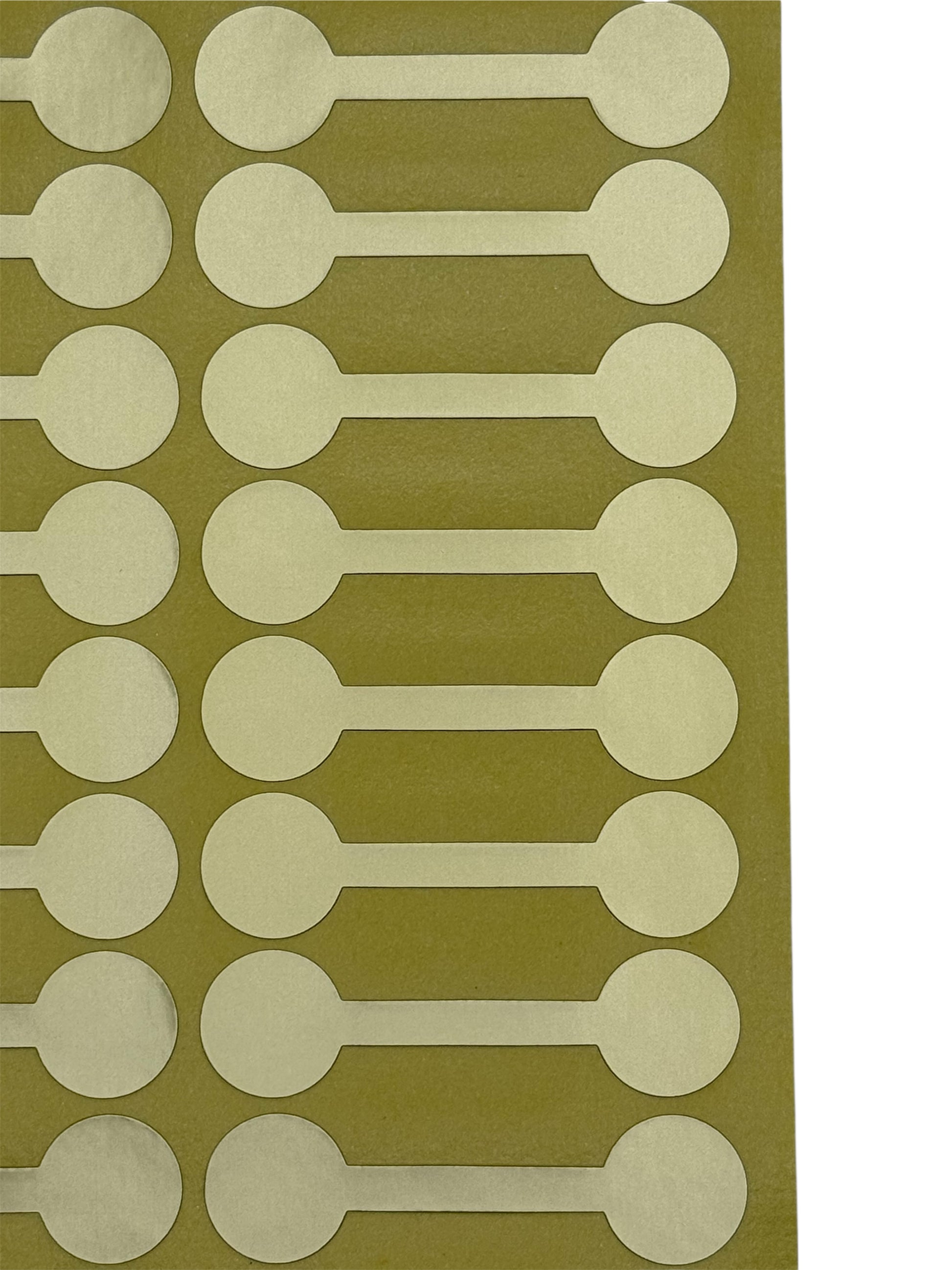 Close up of Gold dumbell stickers