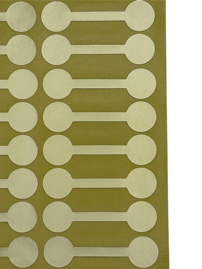 Close up of Gold dumbell stickers