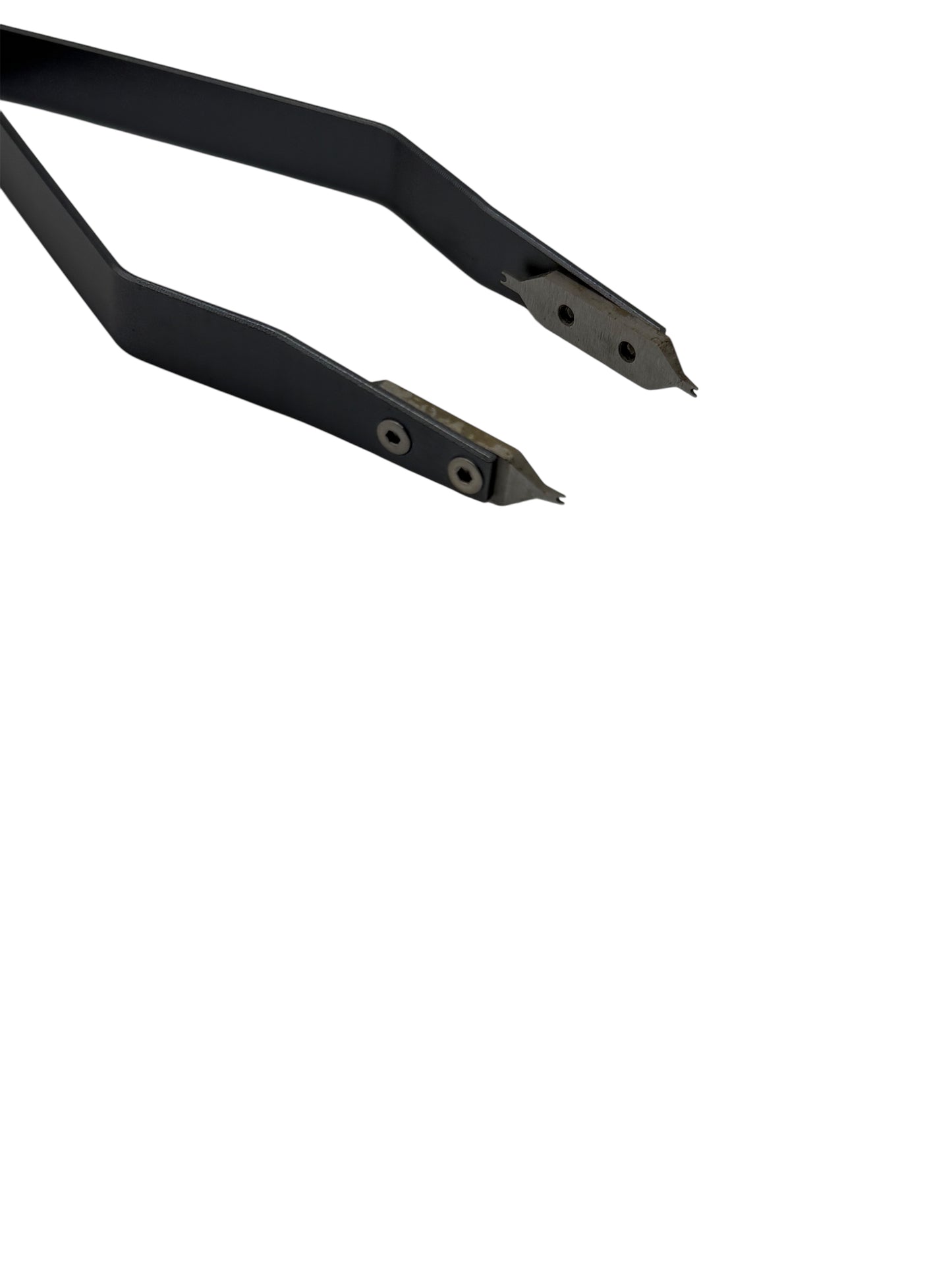 Close up of spring bar removal tool on white background
