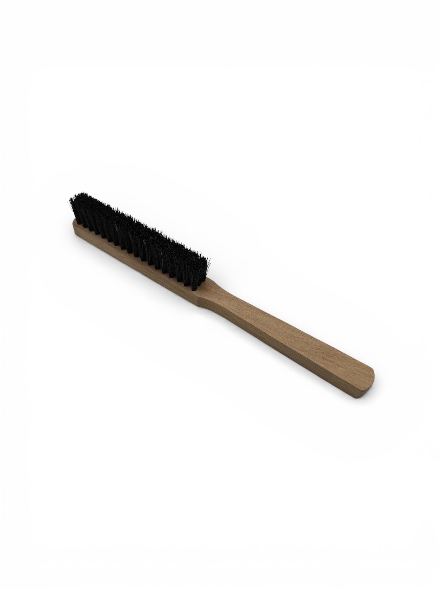 Black bristle brush with a wooden handle
