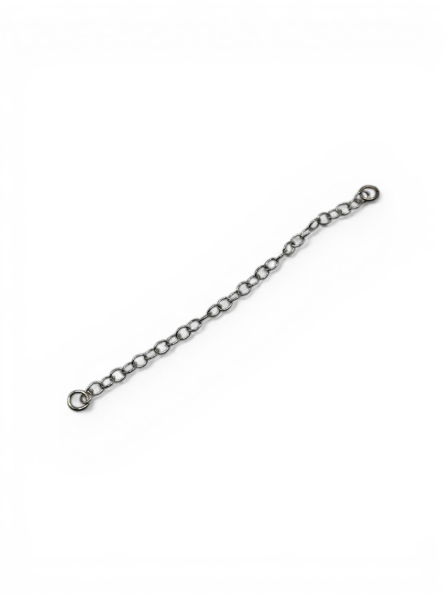 Silver safety chain on white background