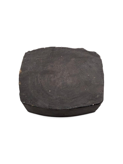 Small block of Grey Menzerna polishing compound