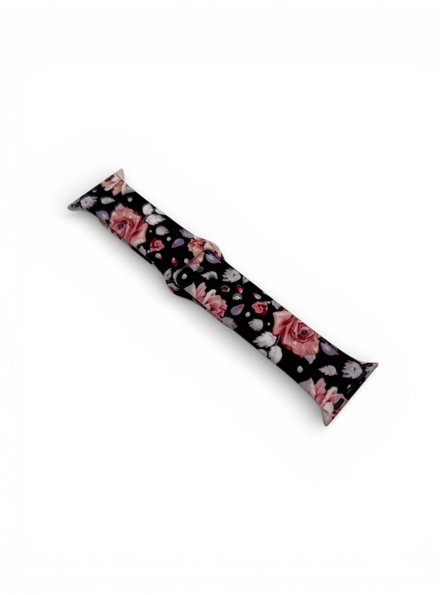 A long, narrow rectangular item with a black background and a pink rose floral pattern, photographed on a plain white background.