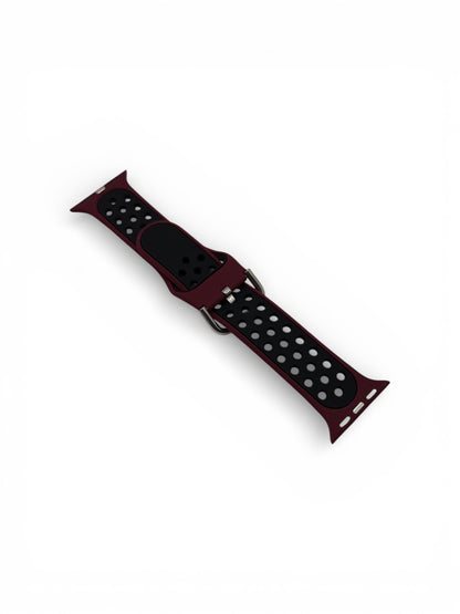 A dark red and black sport band with silver polka dots, shown diagonally on a plain white background.