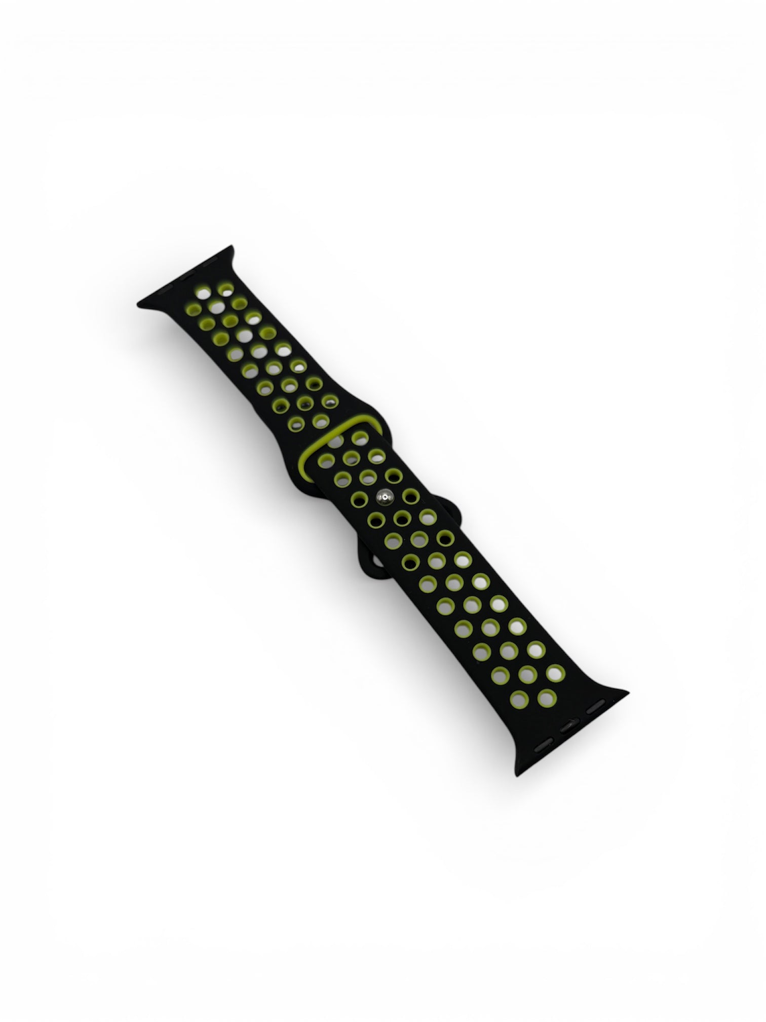 A black athletic watch band with a pattern of circular cutouts filled with small lime green dots, shown diagonally on a plain white background.