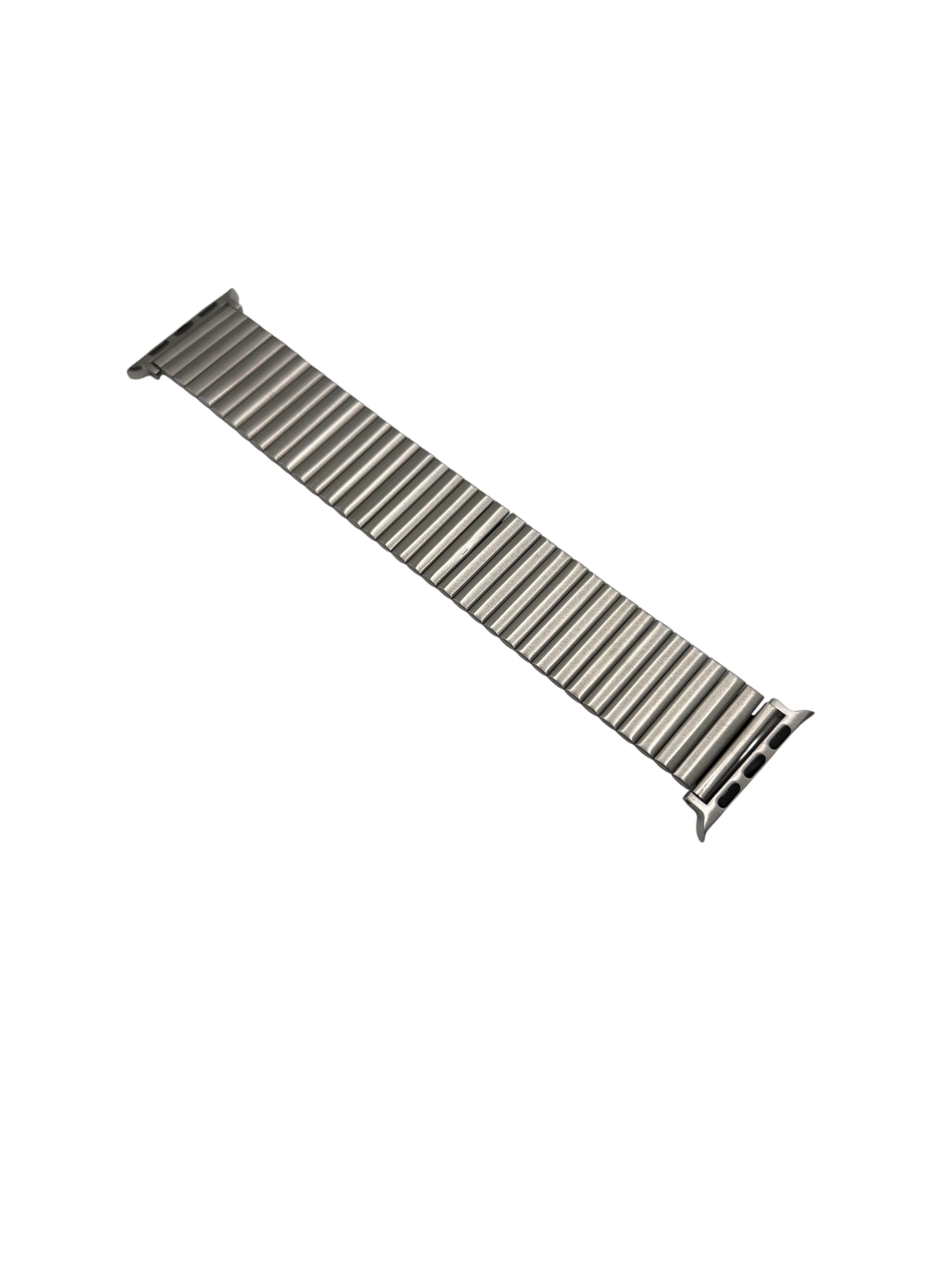 Metallic watch strap on a white background