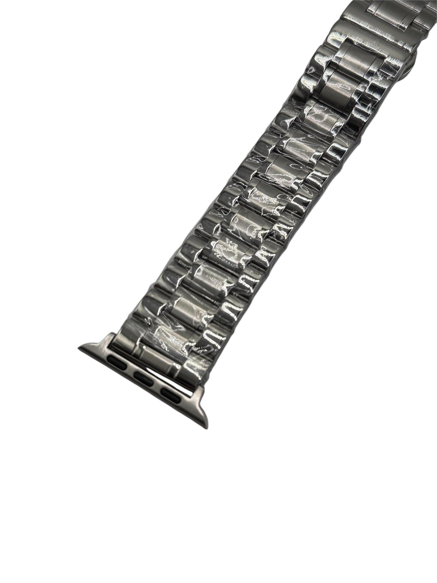 Metallic watch strap on a white background