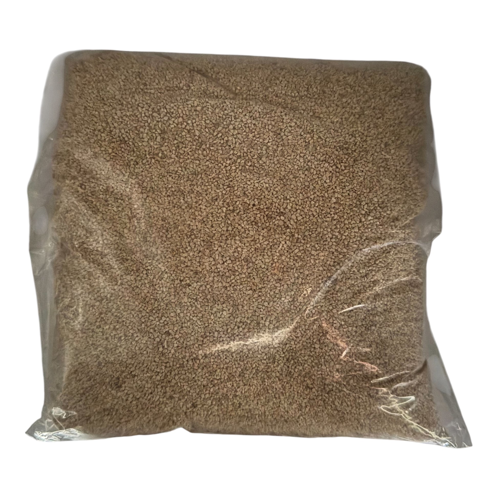 Bag of brown seeds or grains on a white background