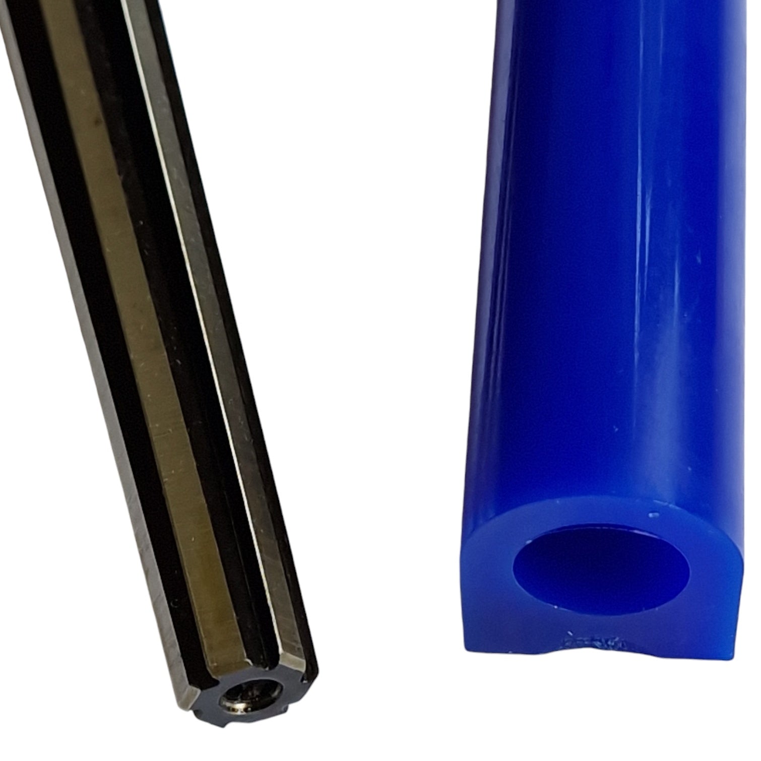 A black steel ring wax cutting mandrel tool with six sharp blades and a blue wax for rings close up