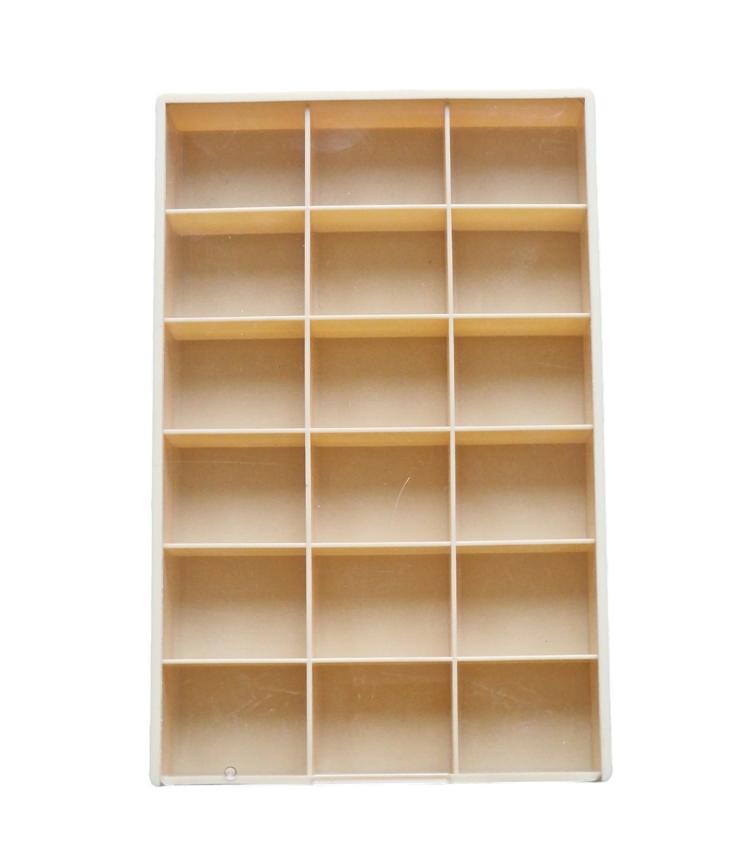 A large plastic storage box with 18 compartments, each labeled with '1' to '18', in a neutral color, likely to be used for organizing jewelry or small items.