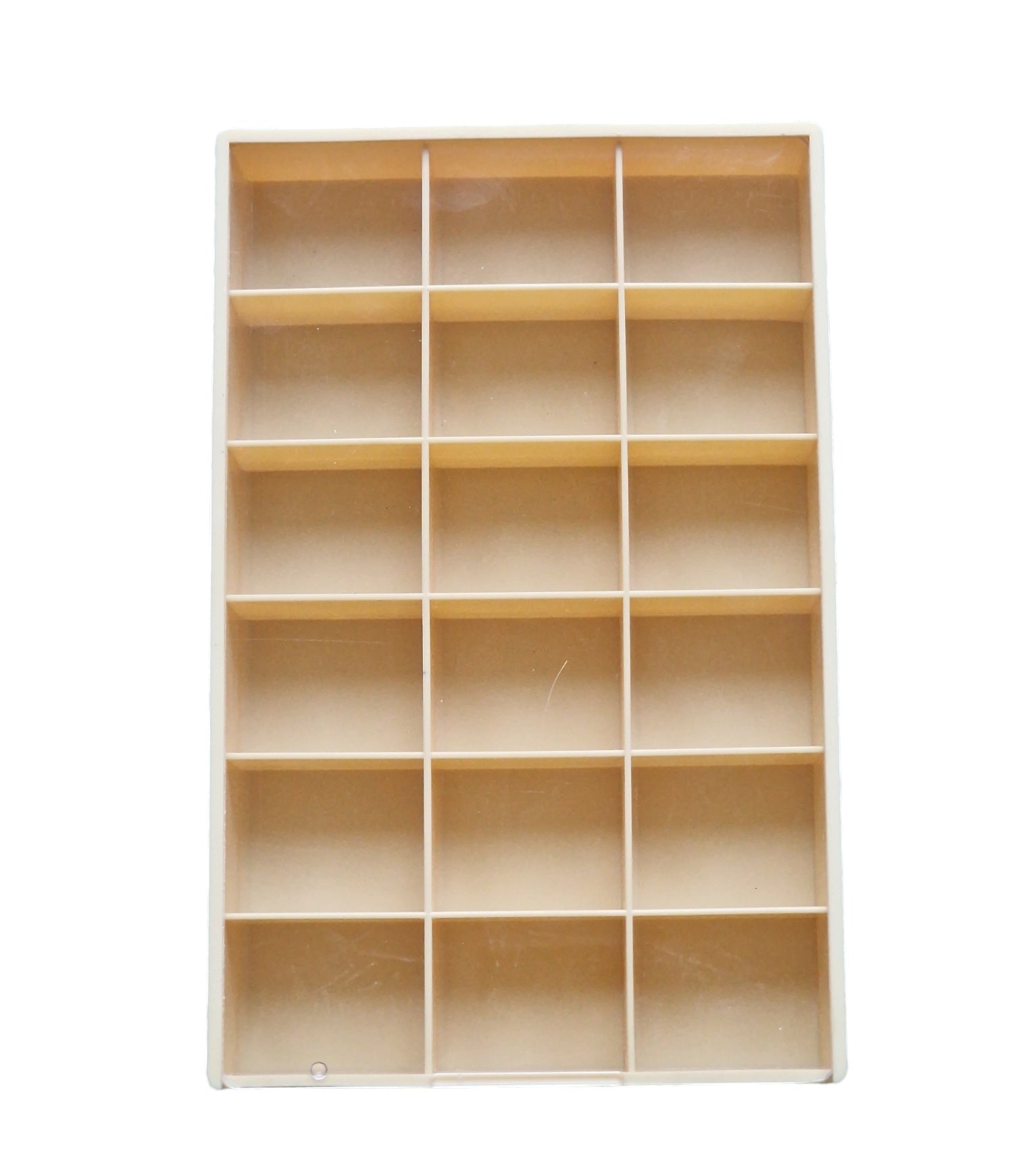 A large plastic storage box with 18 compartments, each labeled with '1' to '18', in a neutral color, likely to be used for organizing jewelry or small items.