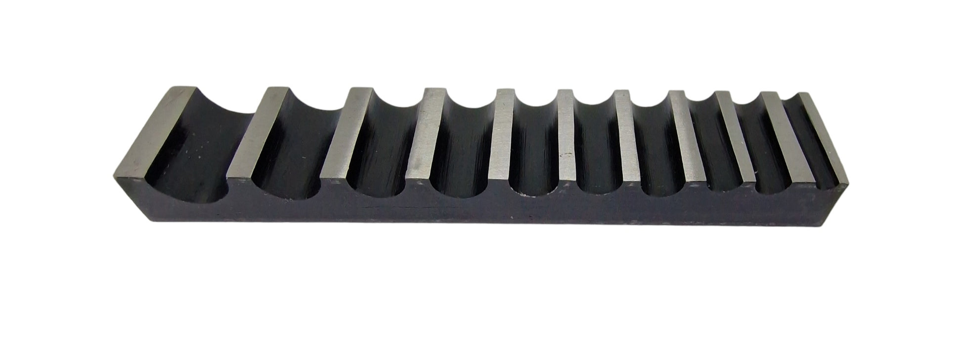 A single-sided steel bending block with ten half-round grooves, used for forming, bending, and shaping metals.