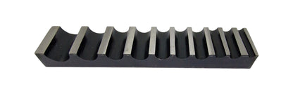 A single-sided steel bending block with ten half-round grooves, used for forming, bending, and shaping metals.