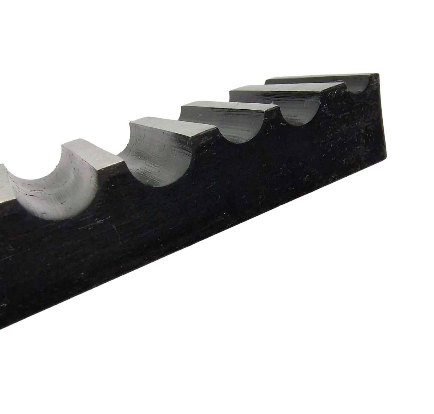 Side view of a single-sided steel bending block with ten half-round grooves, used for forming, bending, and shaping metals.
