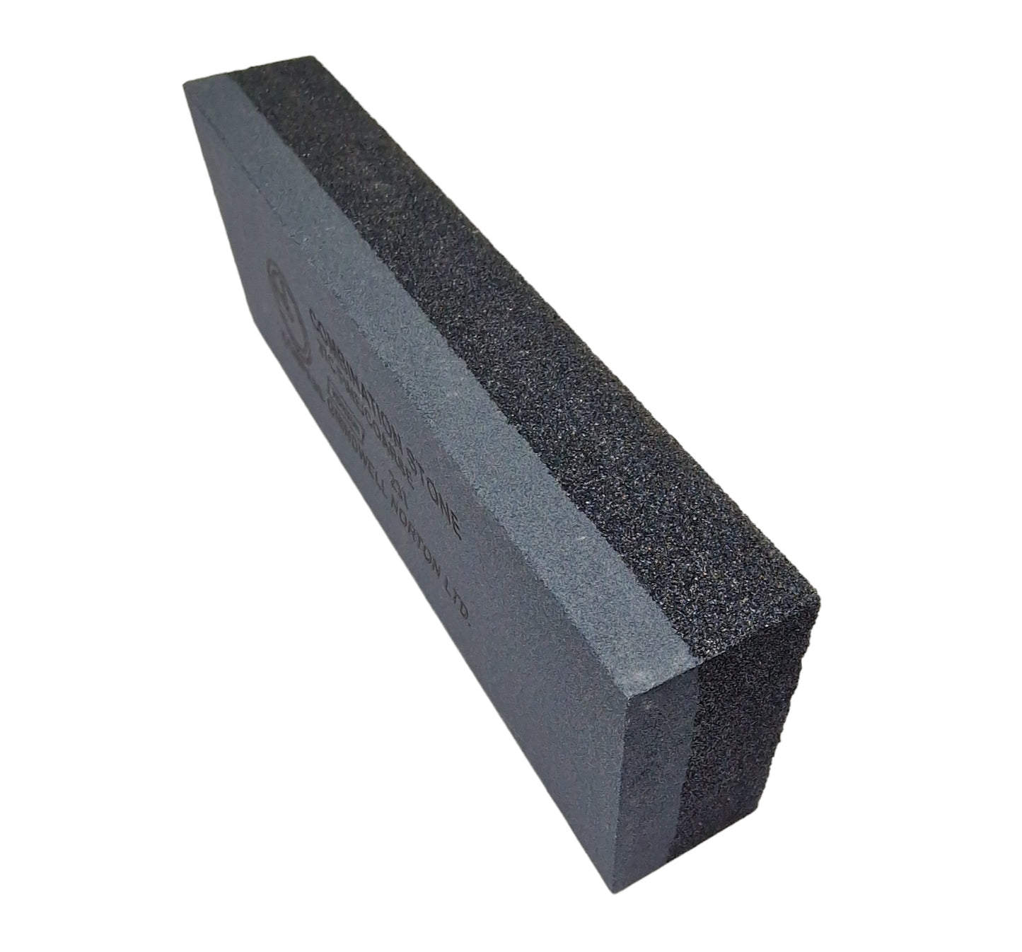 Combination sharpening stone sitting on it’s side
