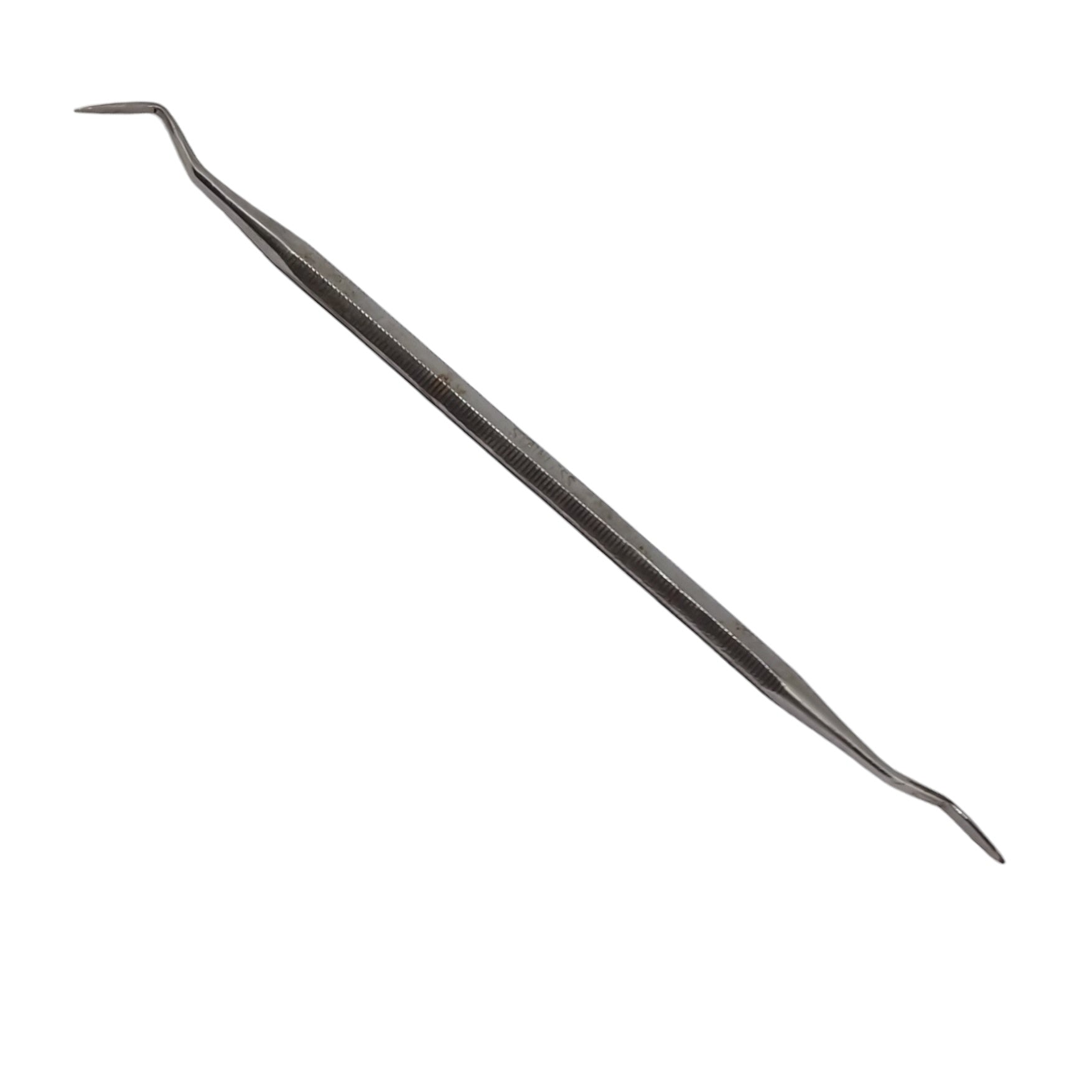 Double ended wax carving tool on white background