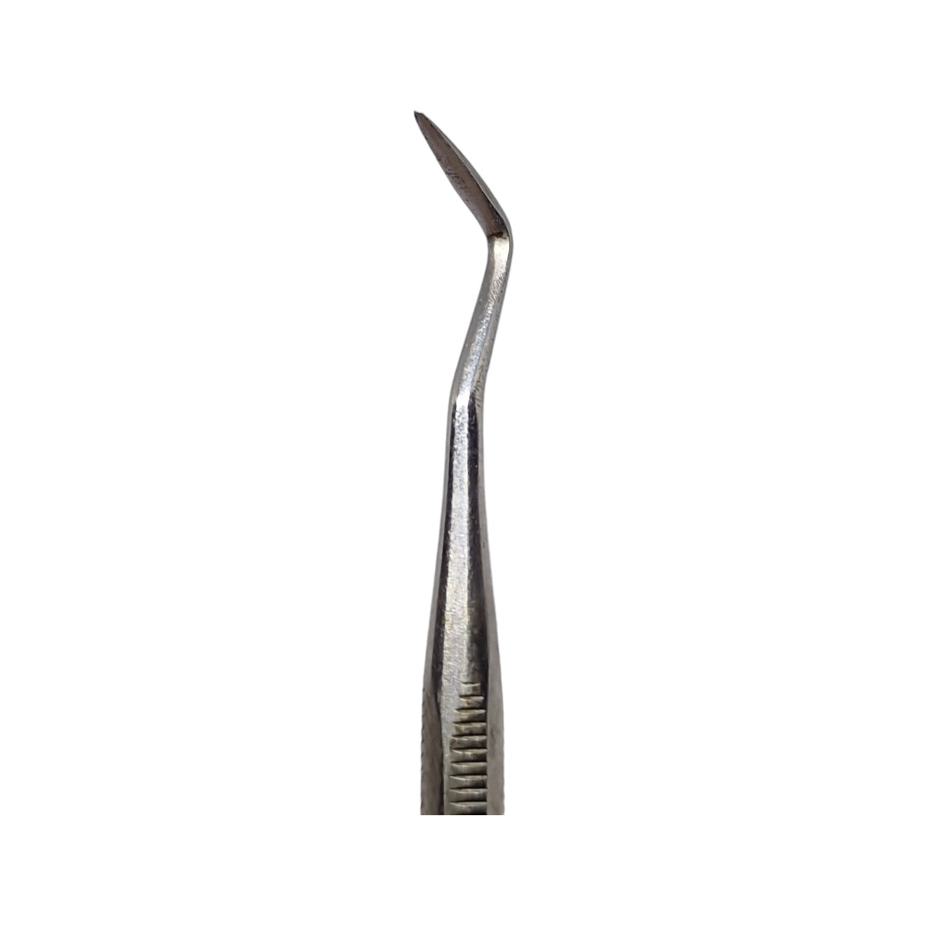 A double-ended stainless steel wax carving tool with one end pointed and the other end flat, against a white background.