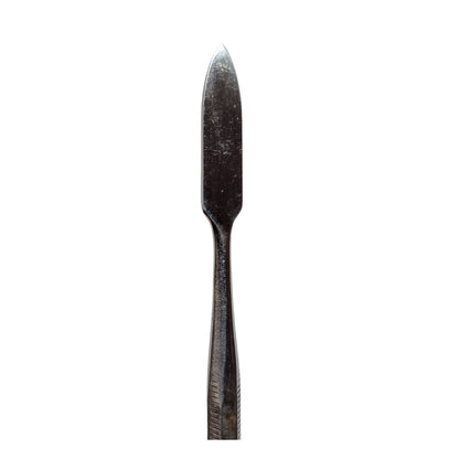 Close up of a wax carving tool
